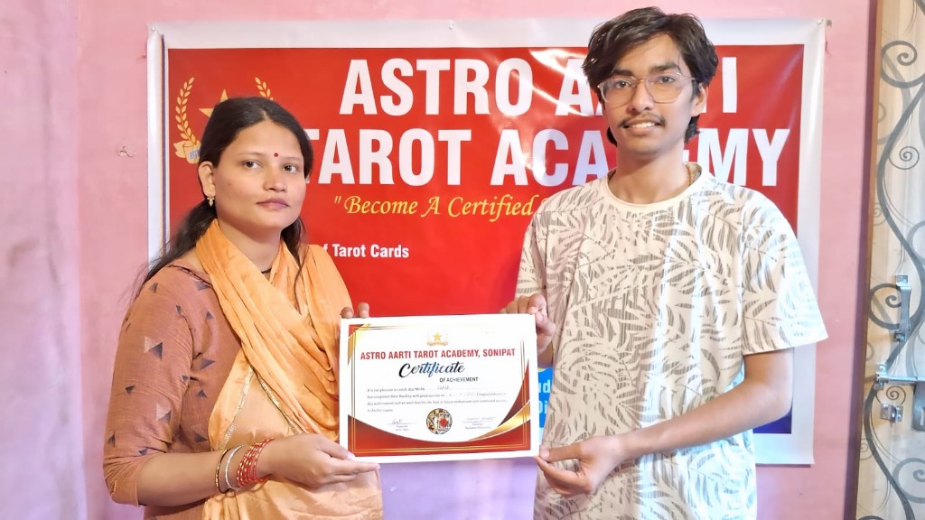 Tarot Aarti with a student and a Certificate of Achievement