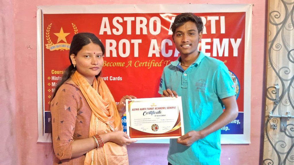Tarot Aarti awarding a tarot reading certificate in Sonipat